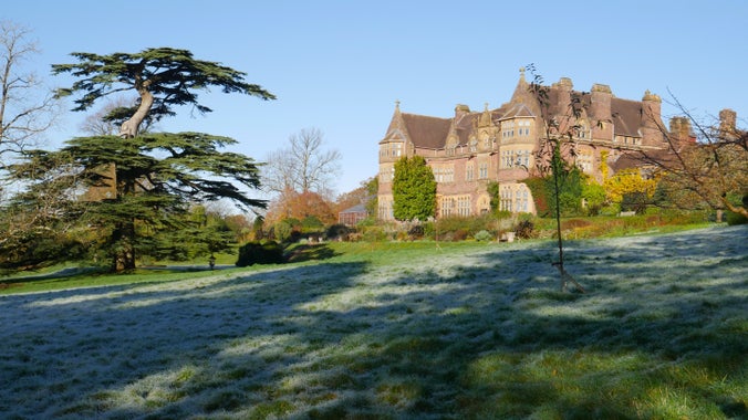 The house and frosty front garden at Knightshayes, Devon.